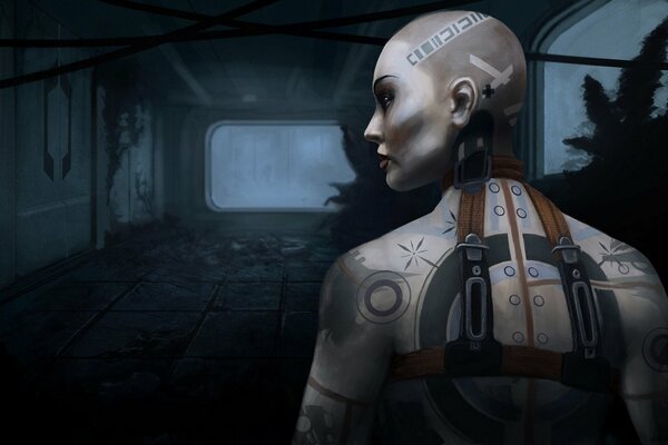 Bald girl with a tattooed body