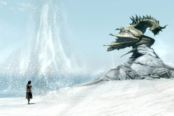 A dragon sits on a rock in winter