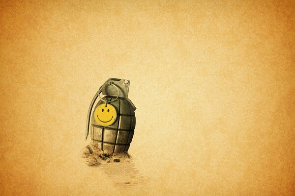 The grenade is buried in the sand on a yellow background
