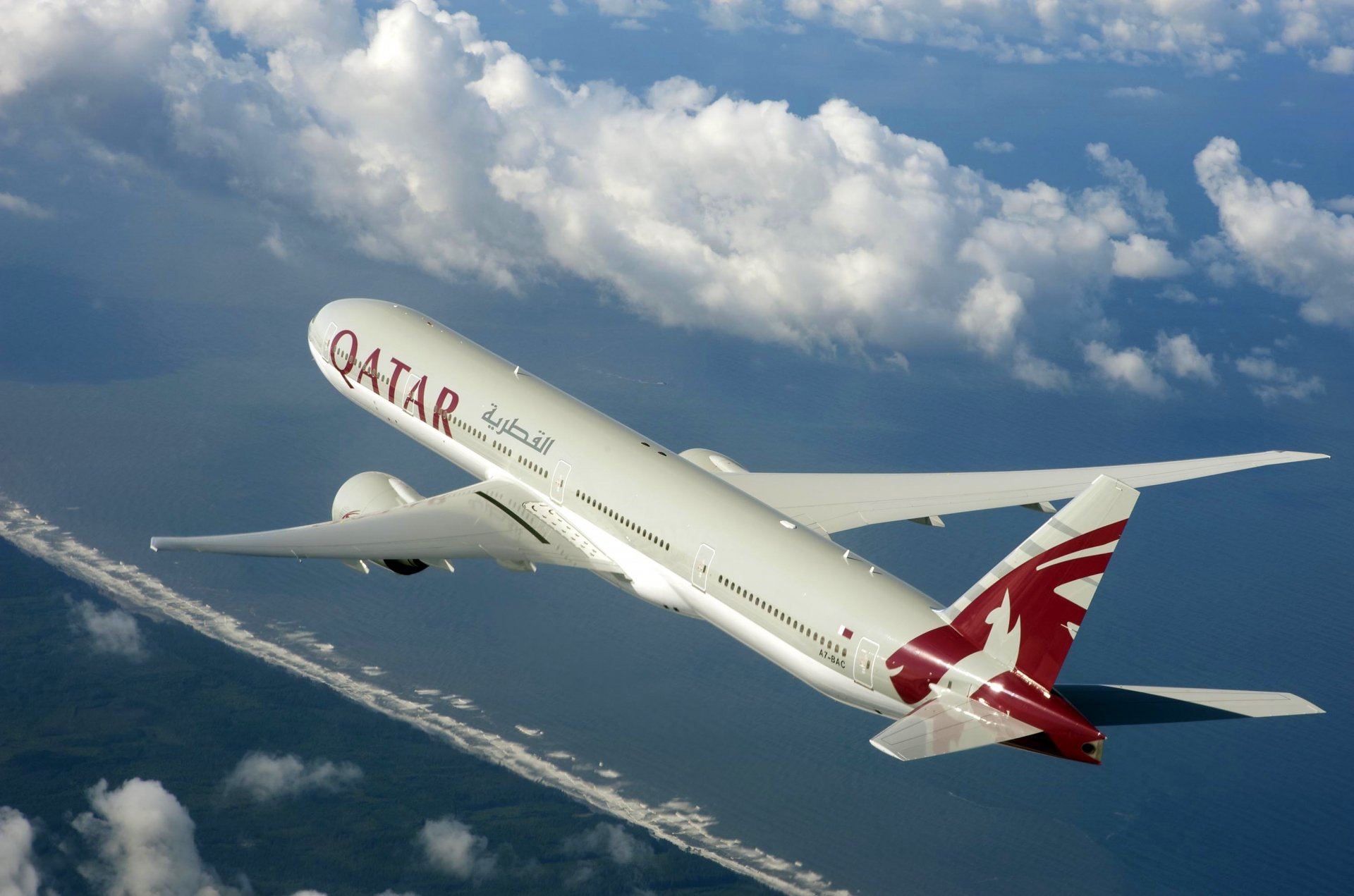 passenger airliner boeing er qatar airplane sky weather wings passenger airplane fly