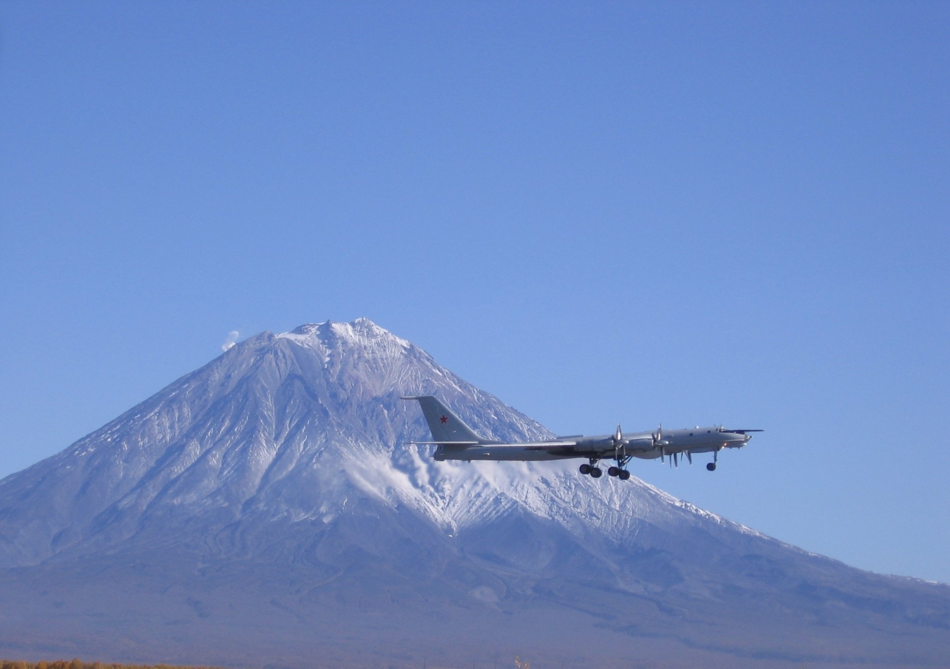 long-range aviation strategic bomber tu-142 mountain sky off