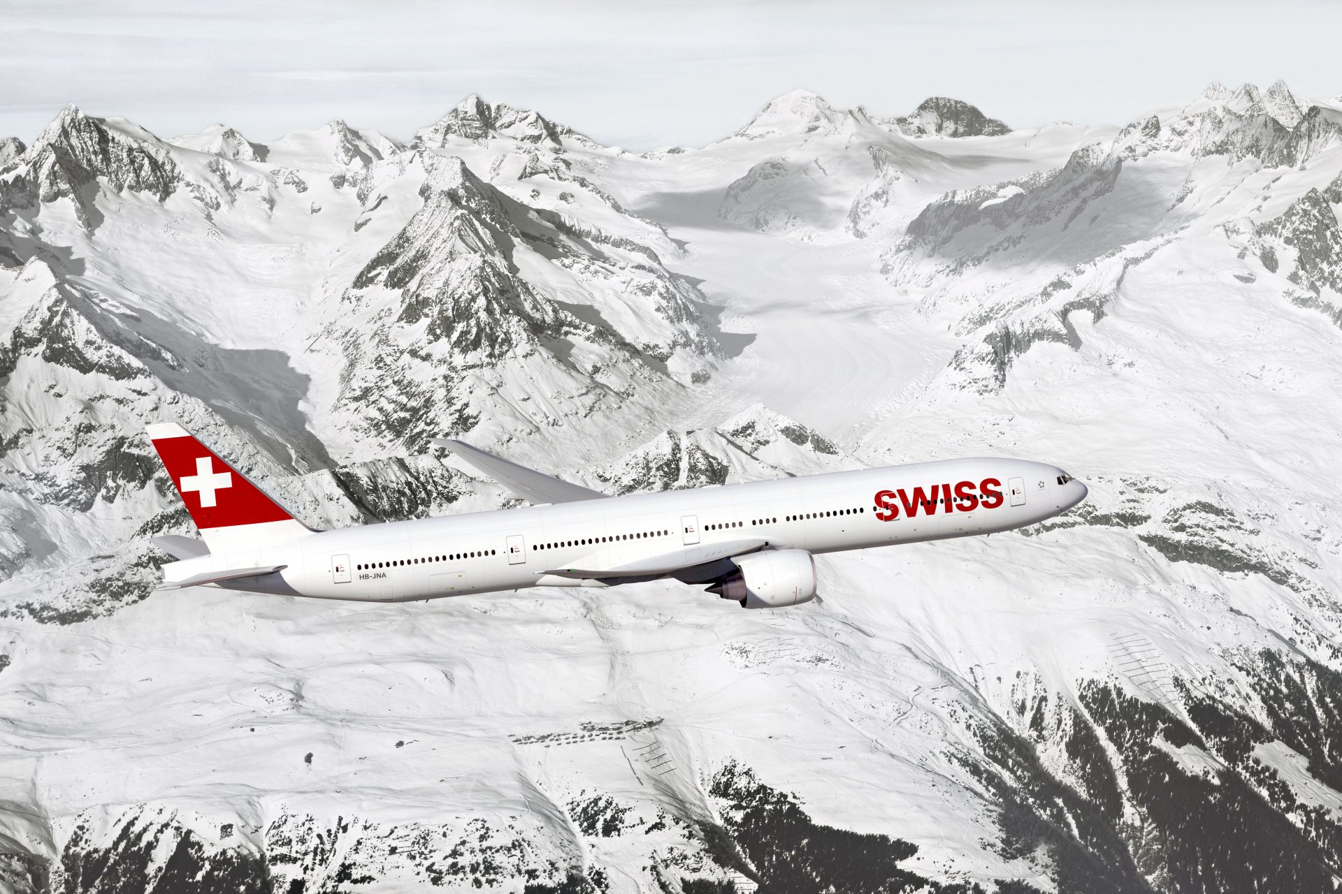 swiss aereo passeggero aereo di linea boeing er altezza ala motore cielo montagne rocce neve aereo di linea passeggeri volo rocce