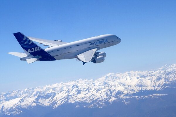 White airbus a830 plane in the sky