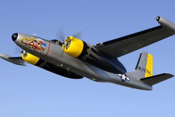 Airplane with propellers in the blue sky