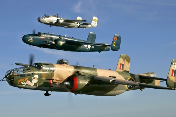 Retro planes flying parados in the sky