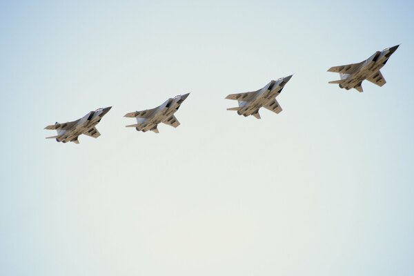 Mig-31 planes are flying in the sky at the Air Show