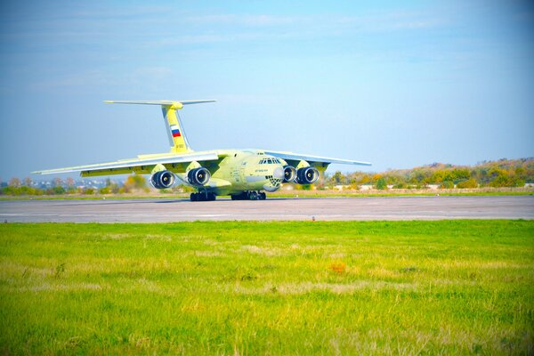 A military plane is on the runway