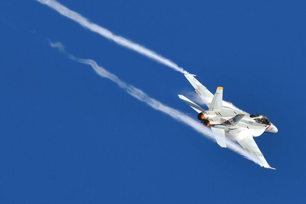 Fighter plane bomber attack aircraft trail in the sky