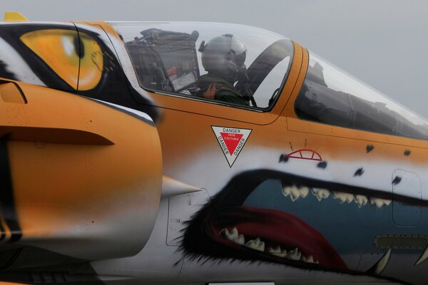 A fighter with a painted mouth and eyes