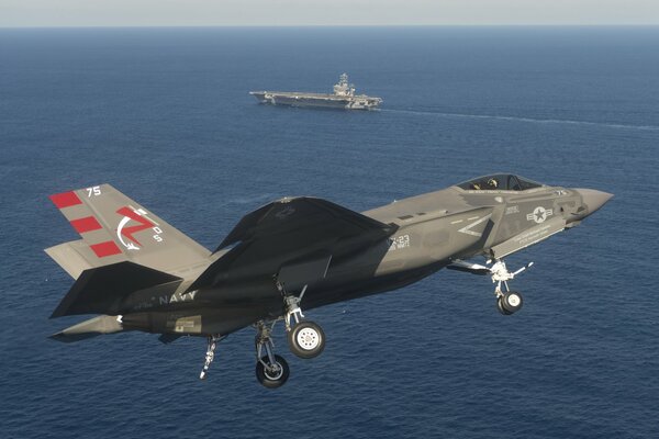 Fighter bomber at sea at the aircraft carrier