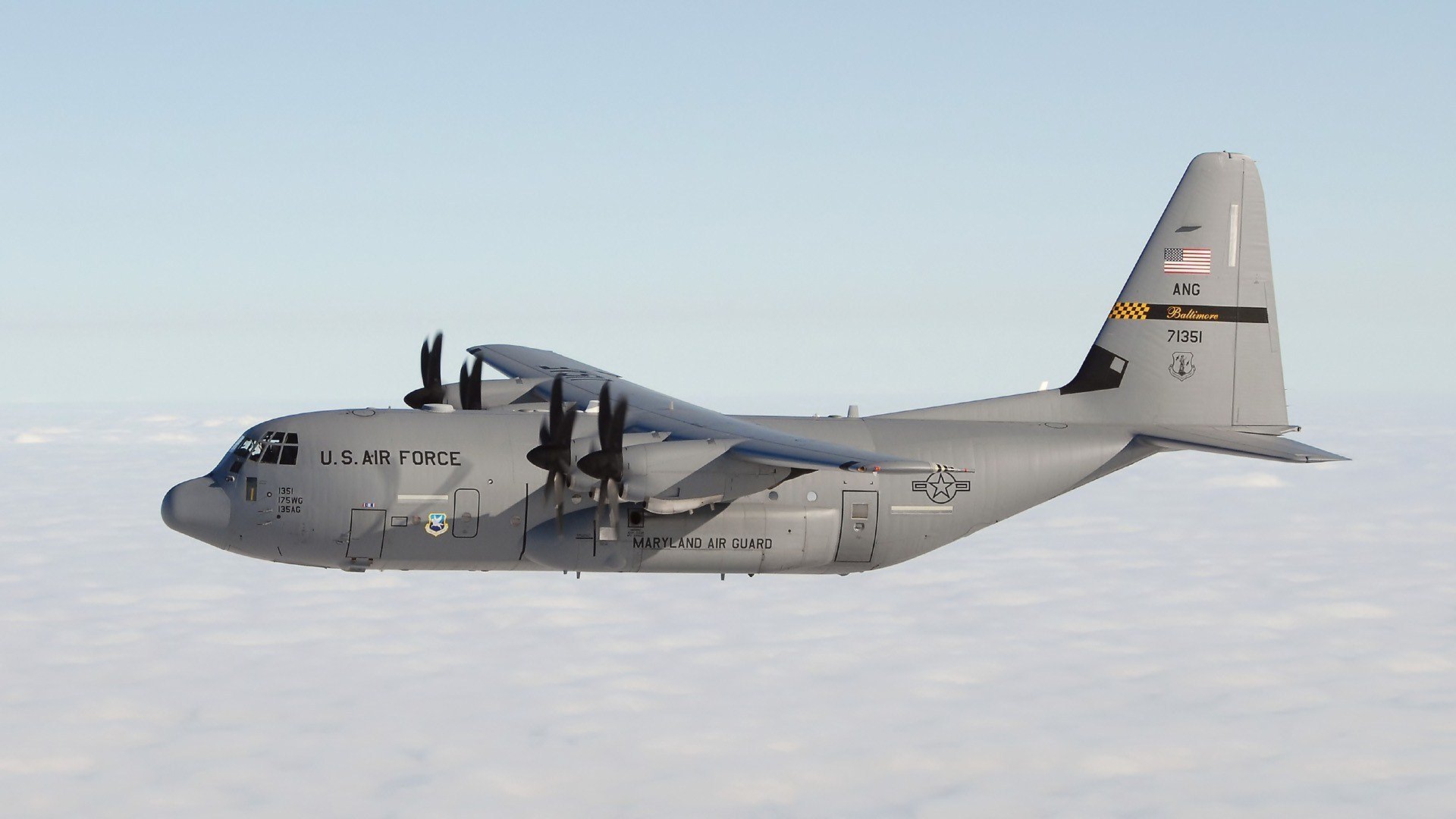 lockheed c-130 hercules military transport plane medium and large range united states flies cloud