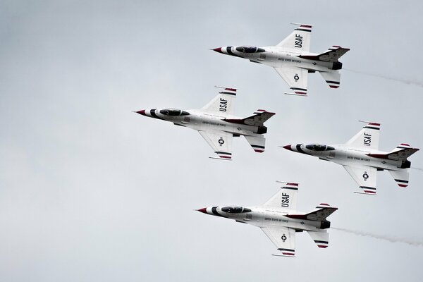 Fighters in the sky performing aerobatics