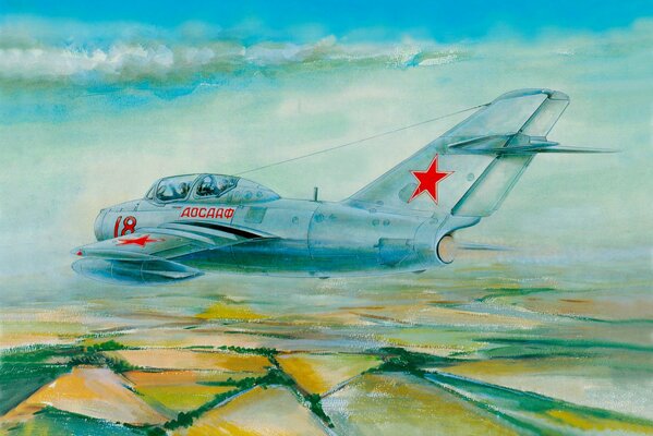 Figura del caza MIG 15 volando sobre los campos