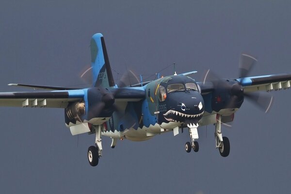 American deck-based anti-submarine aircraft in blue and black coloring Grumman S-2 Tracker .