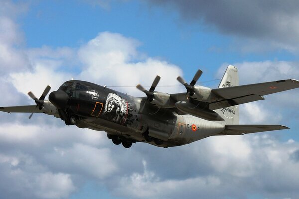 Military transport aircraft flying in the sky