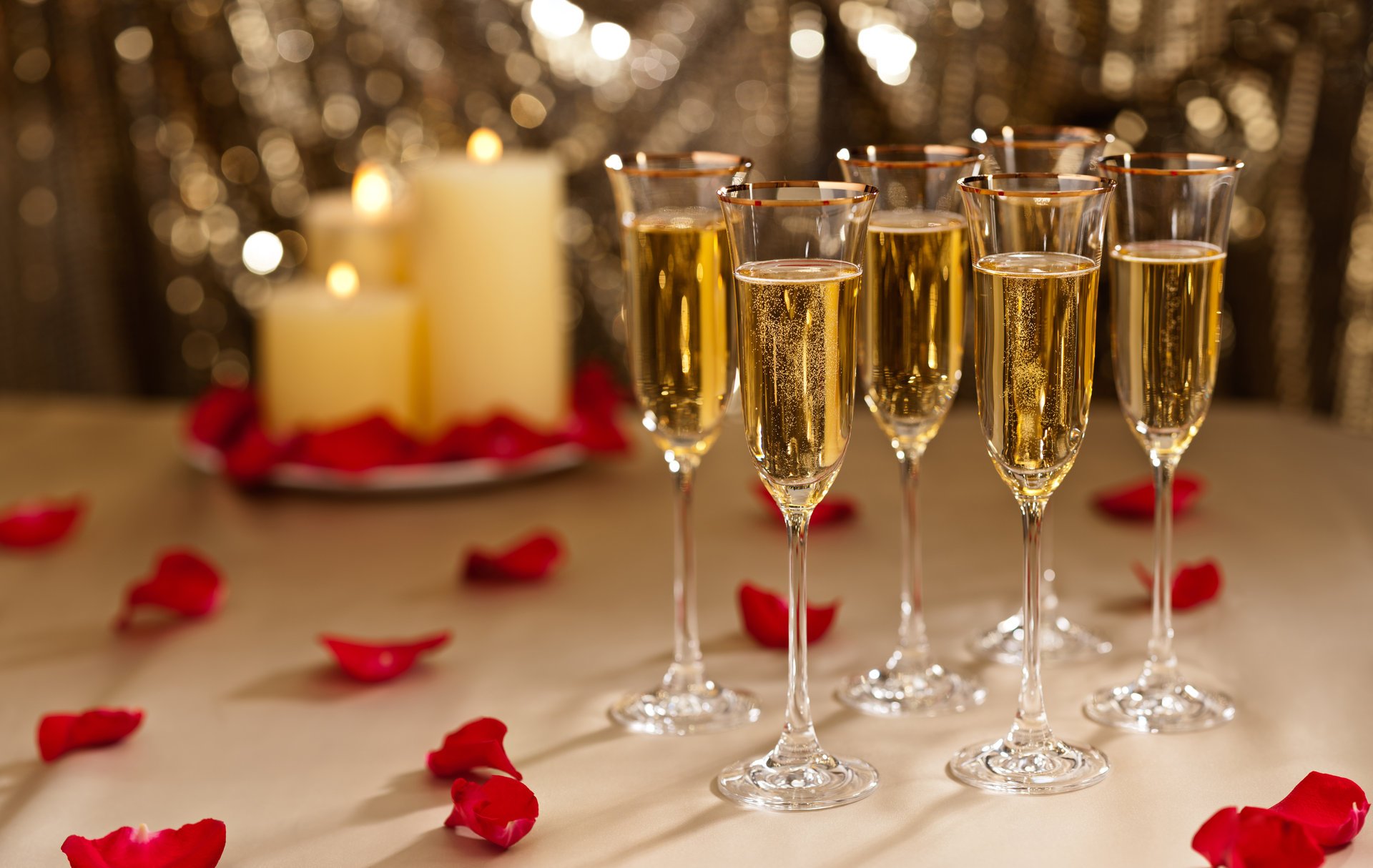 champagne glasses petals rose red candles holiday