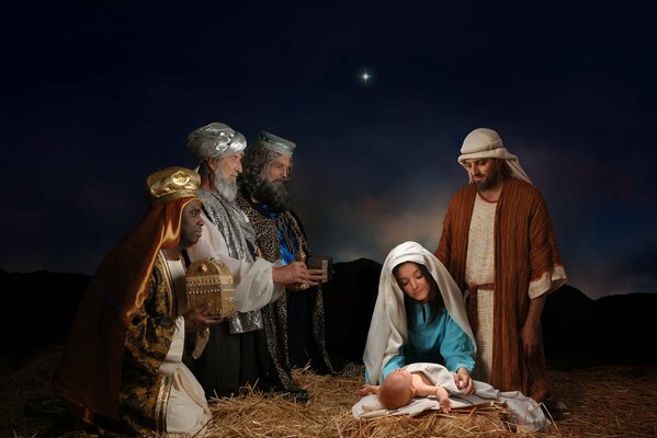 Painting The Birth of Christ under the night sky.