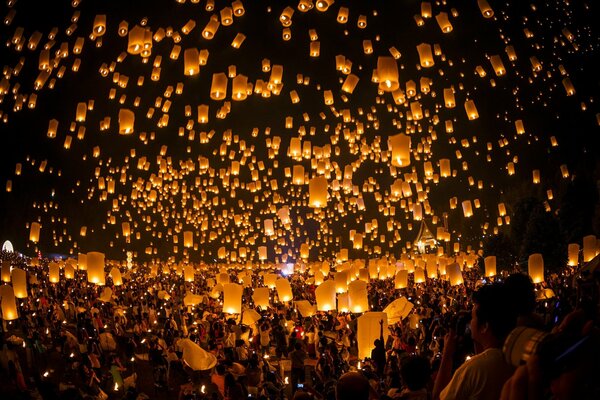 A lot of burning candles on a mass holiday