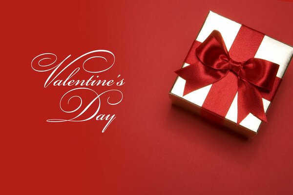 A gift with a red bow for Valentine s Day