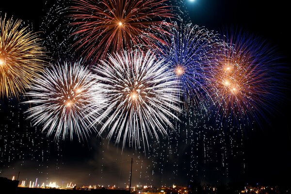 Bright fireworks on the background of the night sky