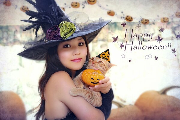 Photo of a girl in a witch costume with a cat for Halloween