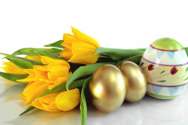 Yellow tulips with Easter eggs wallpaper