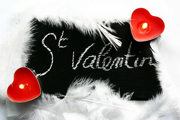 Valentine s Day picture with feathers and candles