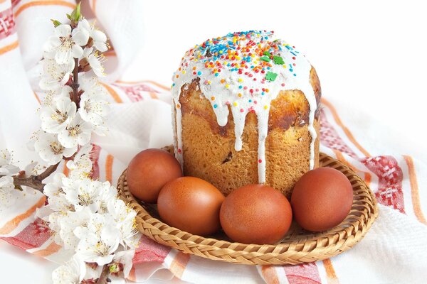 A cake with your own hands for Easter. A sprig of apricot as a decoration