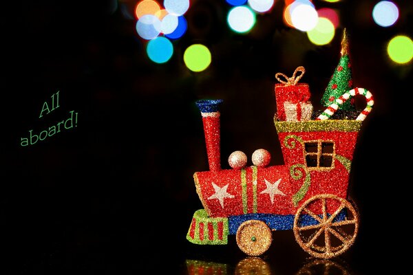 Jouet de Noël. Train avec des cadeaux d arbre de Noël et des bonbons