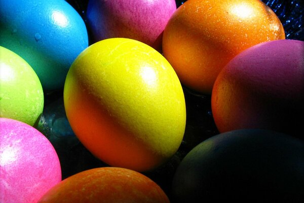 Easter, colorful eggs lie on the surface