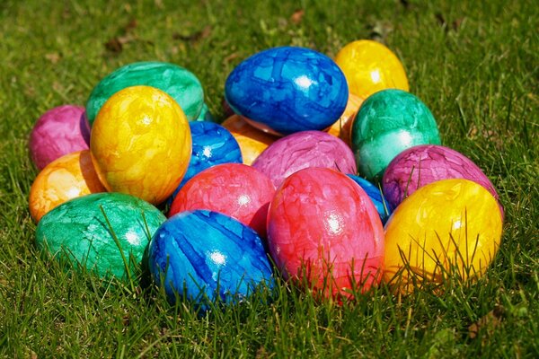 Beautiful multicolored Easter eggs in the grass