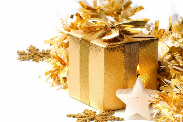 Goldene Box mit Schneeflocken und Sternchen