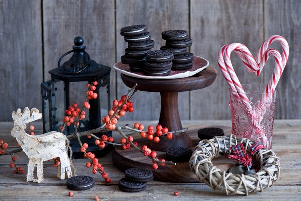 Still life of Chocolate cookies and a candlestick