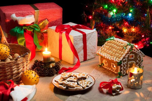 Christmas decorations and treats in front of the Christmas tree