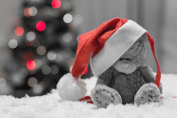 Grey festive bear in a hat