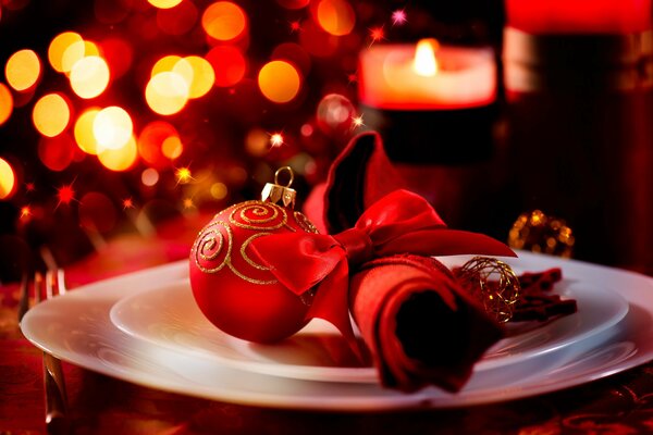 Red color with table setting for New Year and Christmas