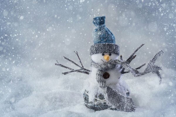 Christmas snowman on white snow