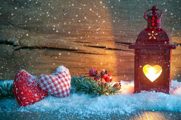 Christmas lantern under the snow