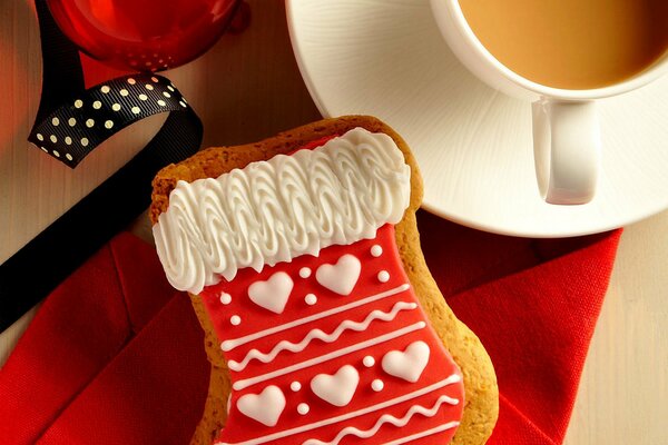 Christmas cookies in icing in the form of a gift sock