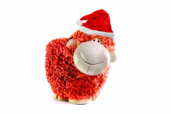 New Year s sheep in a red hat