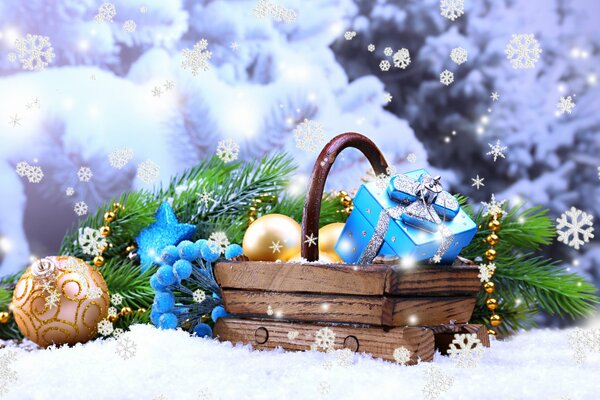 A basket of New Year s gifts in a snowy field