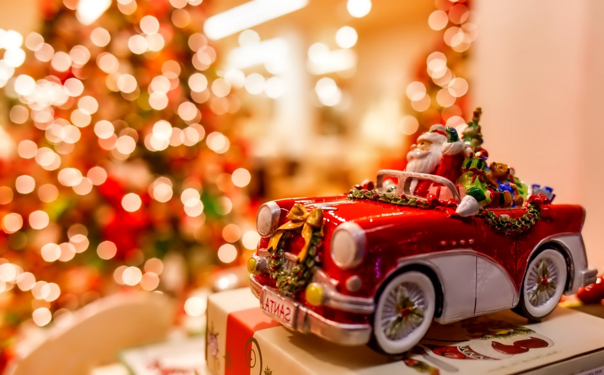 nouvel an noël père noël jouet vacances voiture cadeau bokeh lumières