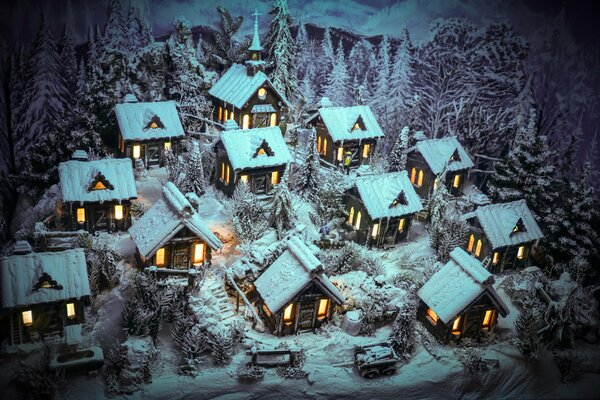 Winter houses in the snow with windows