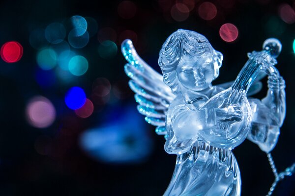 Estatuilla De Ángel. Luces de Navidad