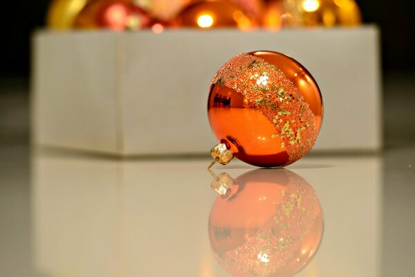 Macro photo of the golden Christmas ball