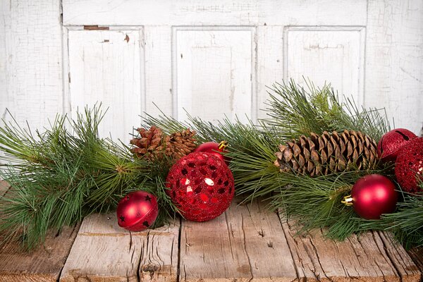 Pine branch with decorations for the new year