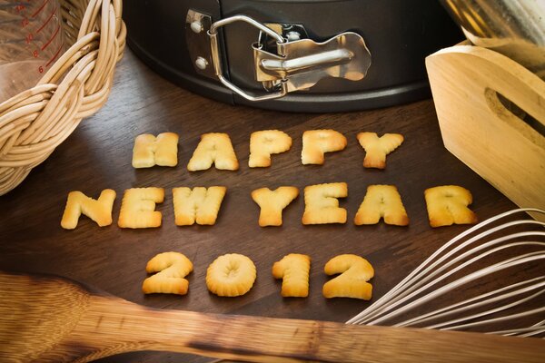 Salutations du nouvel an garnies de biscuits