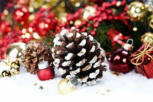 A bump in the snow on the background of balls and beads