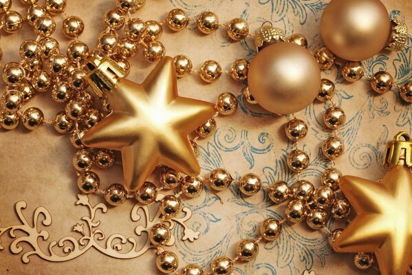 Palle d oro, stelle e perline di Natale
