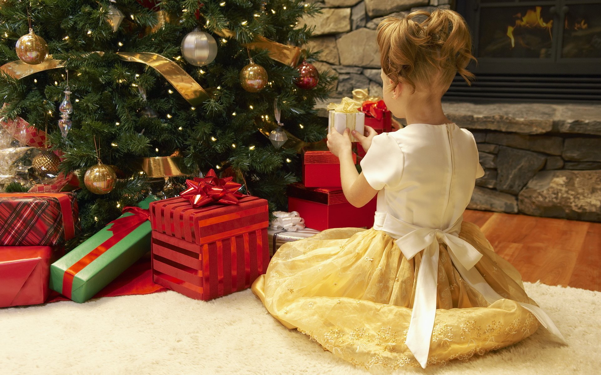 new year holiday christmas tree christmas toys gifts fireplace carpet girl dress girl